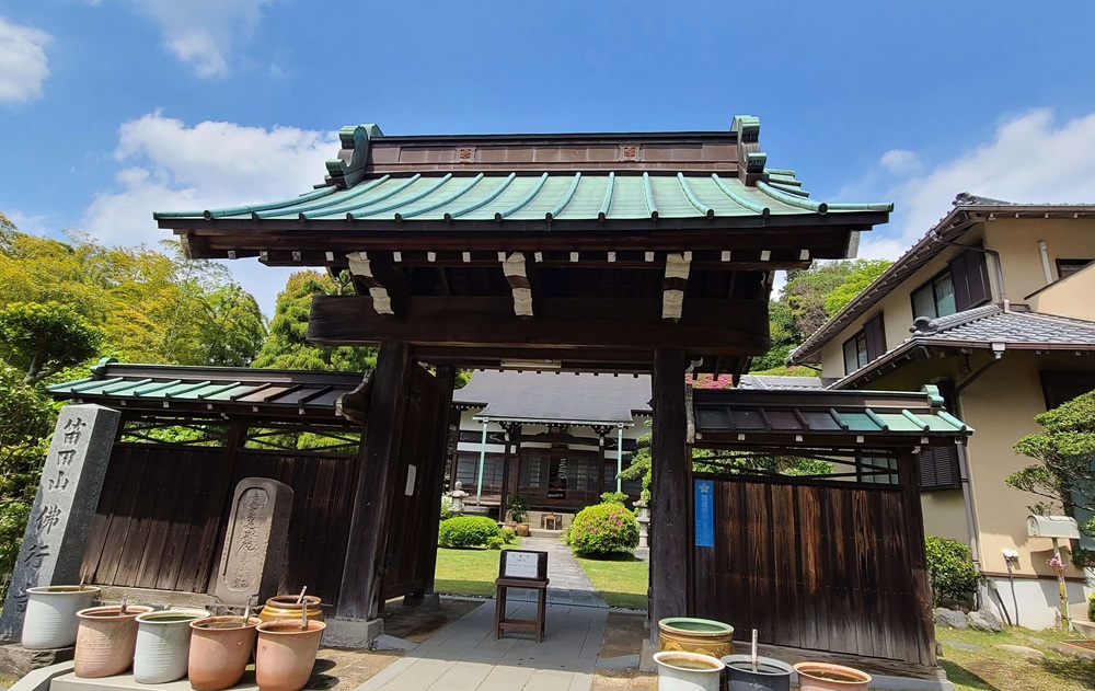 仏行寺　門
